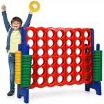 Giant Connect Four Yard game with excited child. 